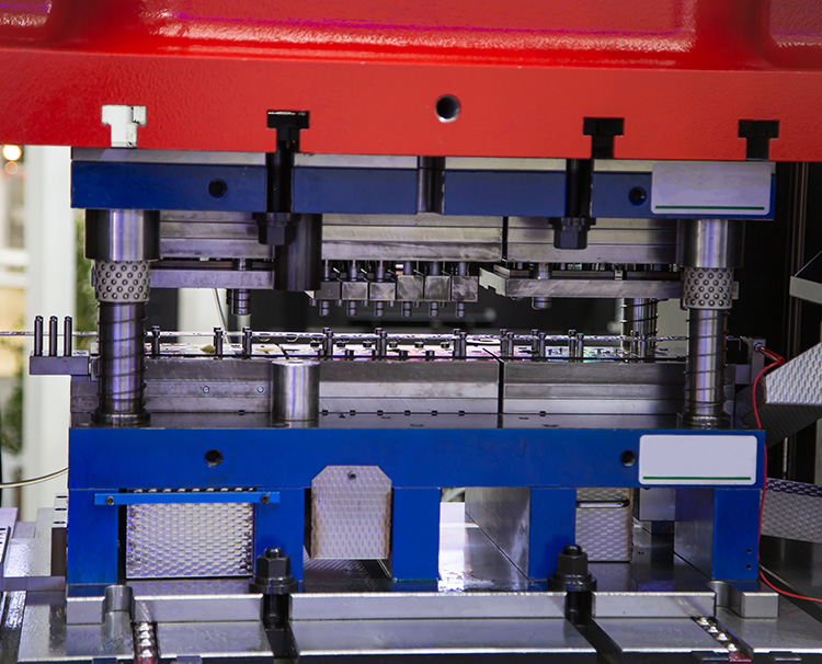 Producing Stamped Metal Parts via Hydraulic Press